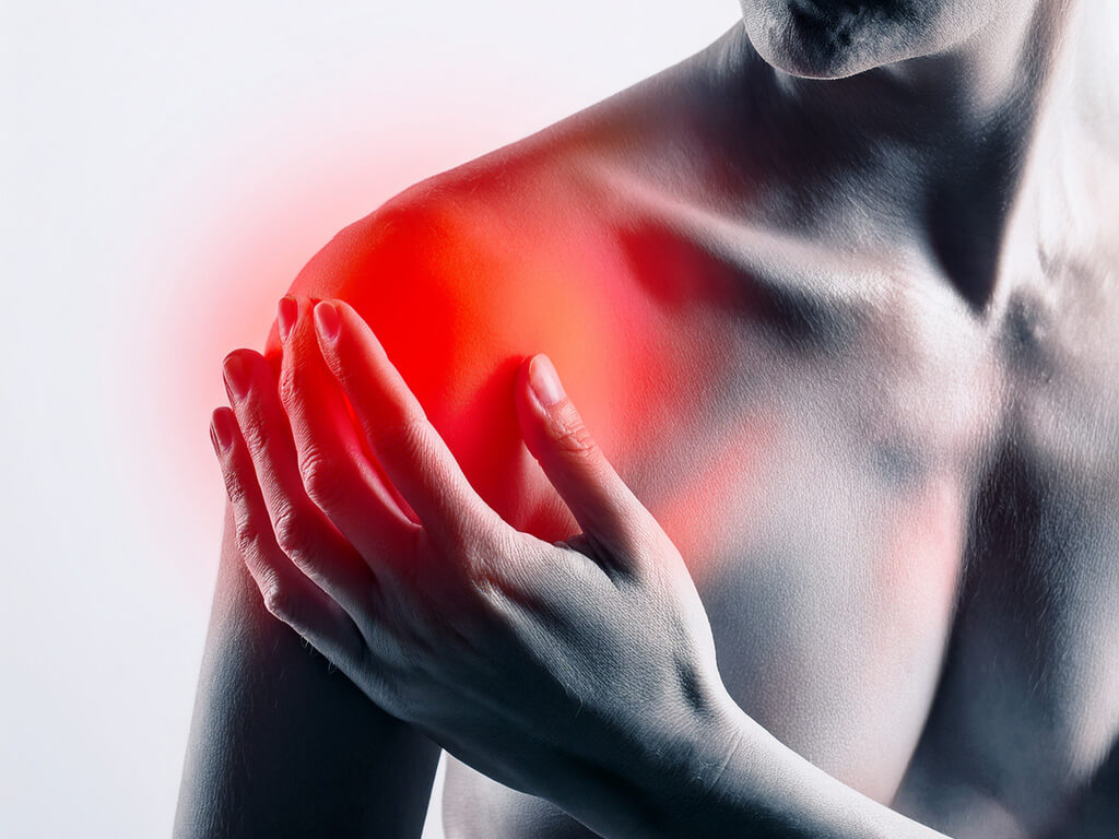 man holding painful shoulder